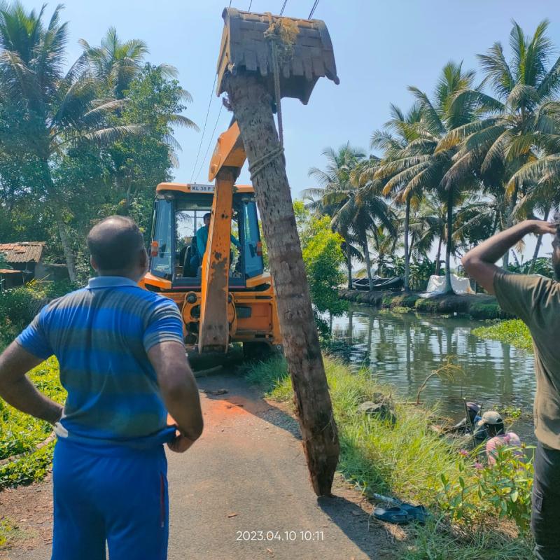 Karichira to Puthussery Road- Coconut piling for DR dumping